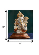 Golden Four-Armed Ganesha