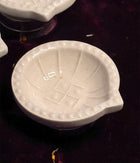 White Swastic Diya Set of 6